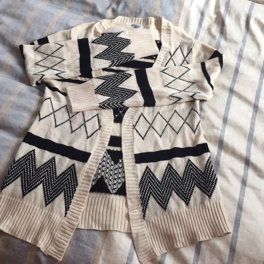 Cream and black open sweater